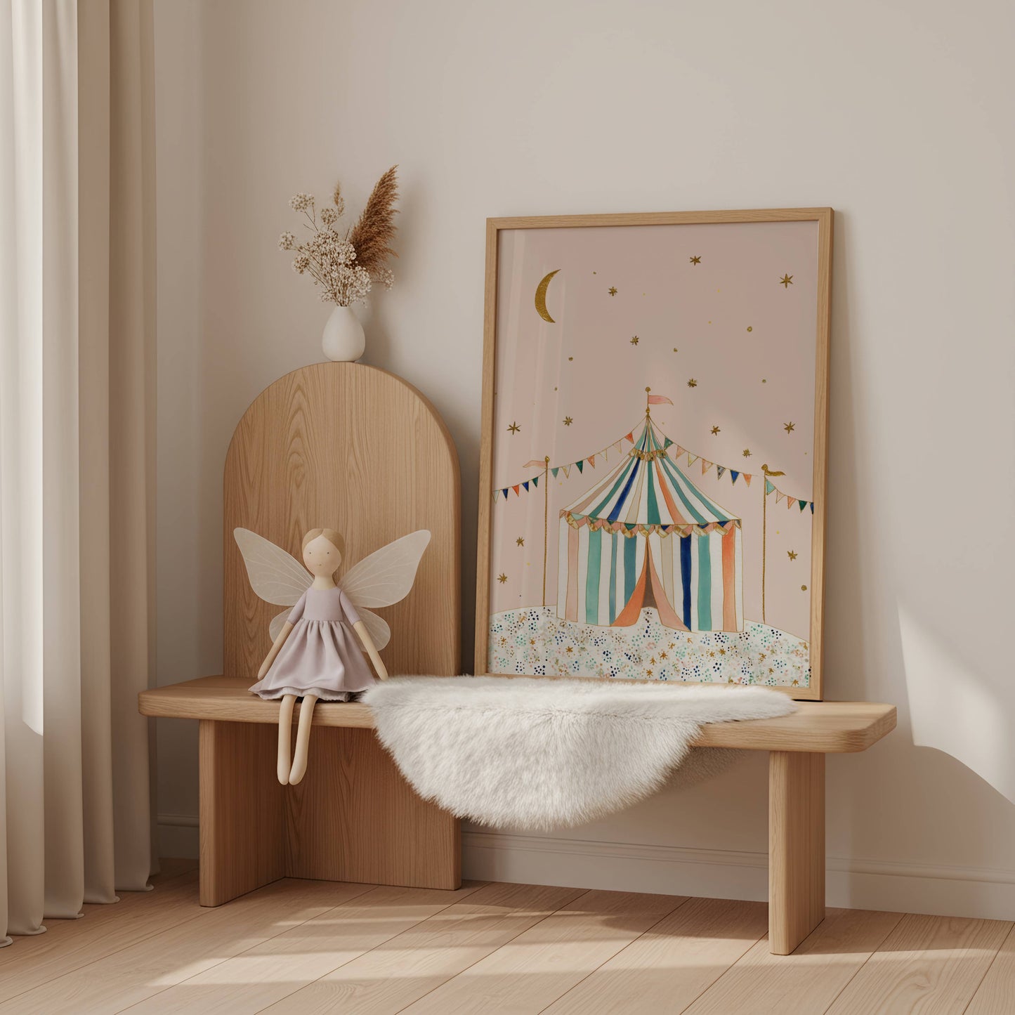 The Circus Tent A4 circus nursery print in a light wood frame