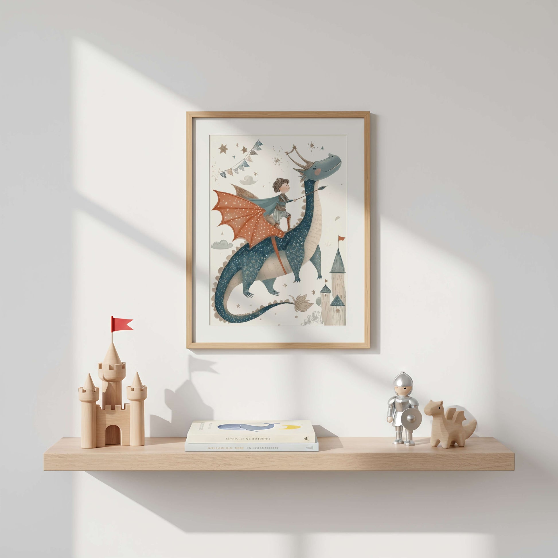 Personalised Dragon and Knight Wall Art — framed dragon and knight print on a nursery wall above a children's shelf with toys and books