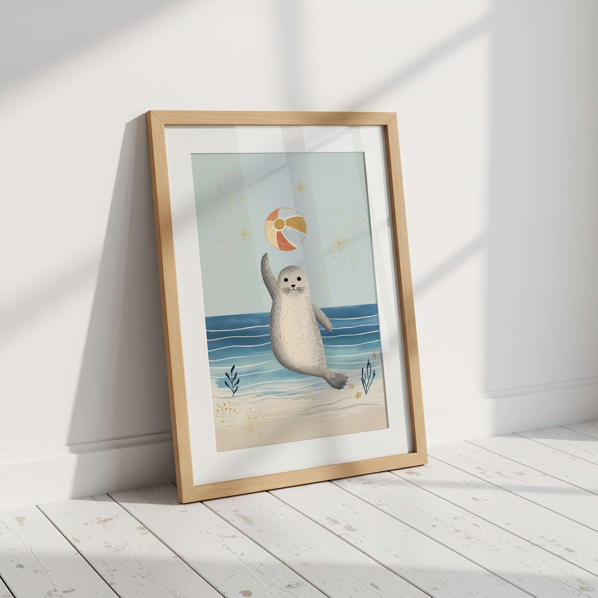 The Seal print styled in a coastal nursery — under the sea collection wall art, unframed