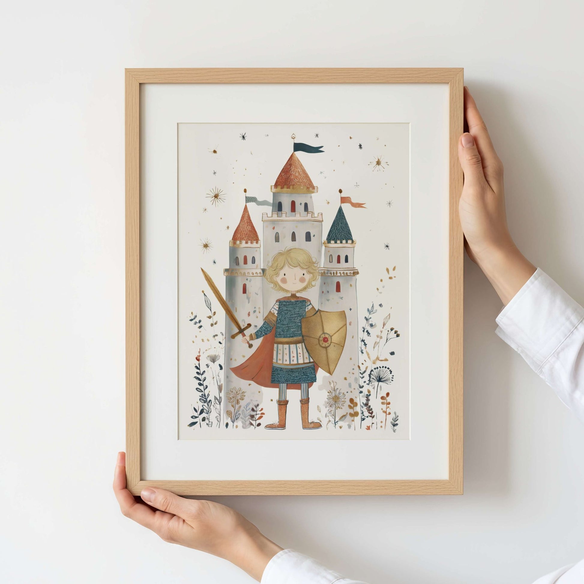 Personalised knight and castle print shown framed and held up against a wall