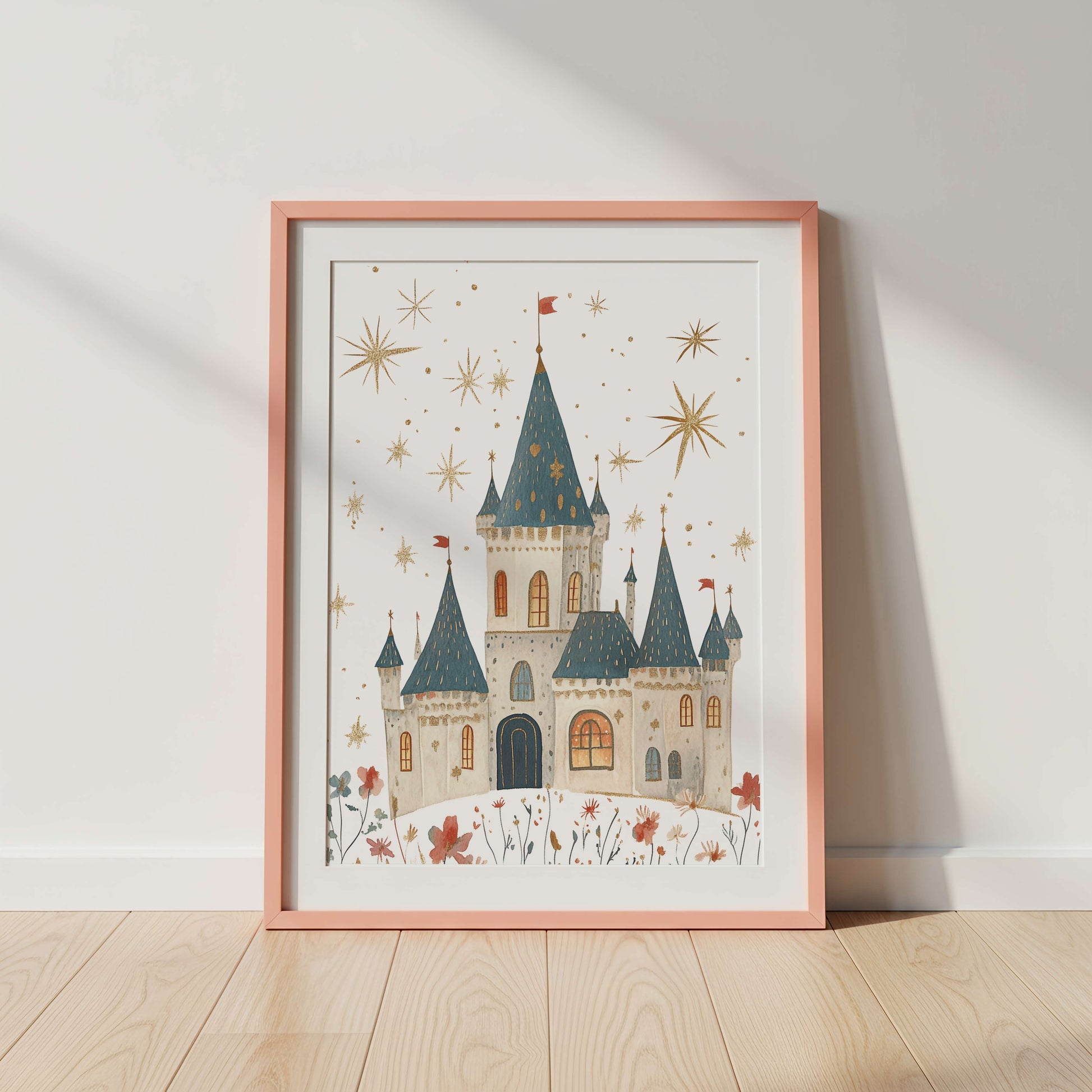Framed illustration of an enchanted fairytale castle on a white wall with wooden floor