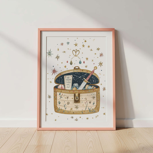 Framed artwork of a fairytale treasure chest with stars and a sword on a white wall.