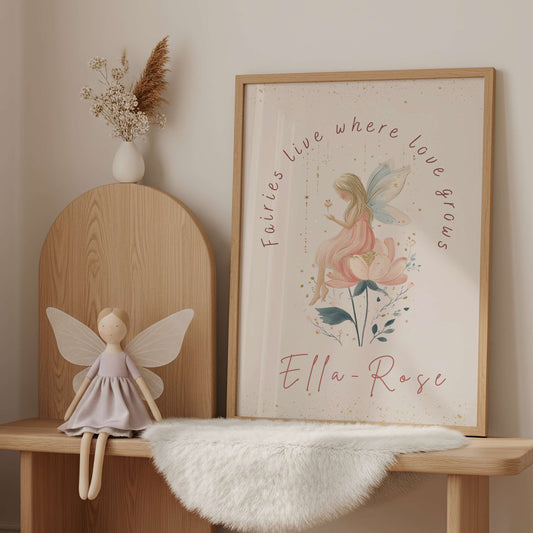 Wooden bench with a fairy doll and framed artwork in a room with light-colored walls and curtains.