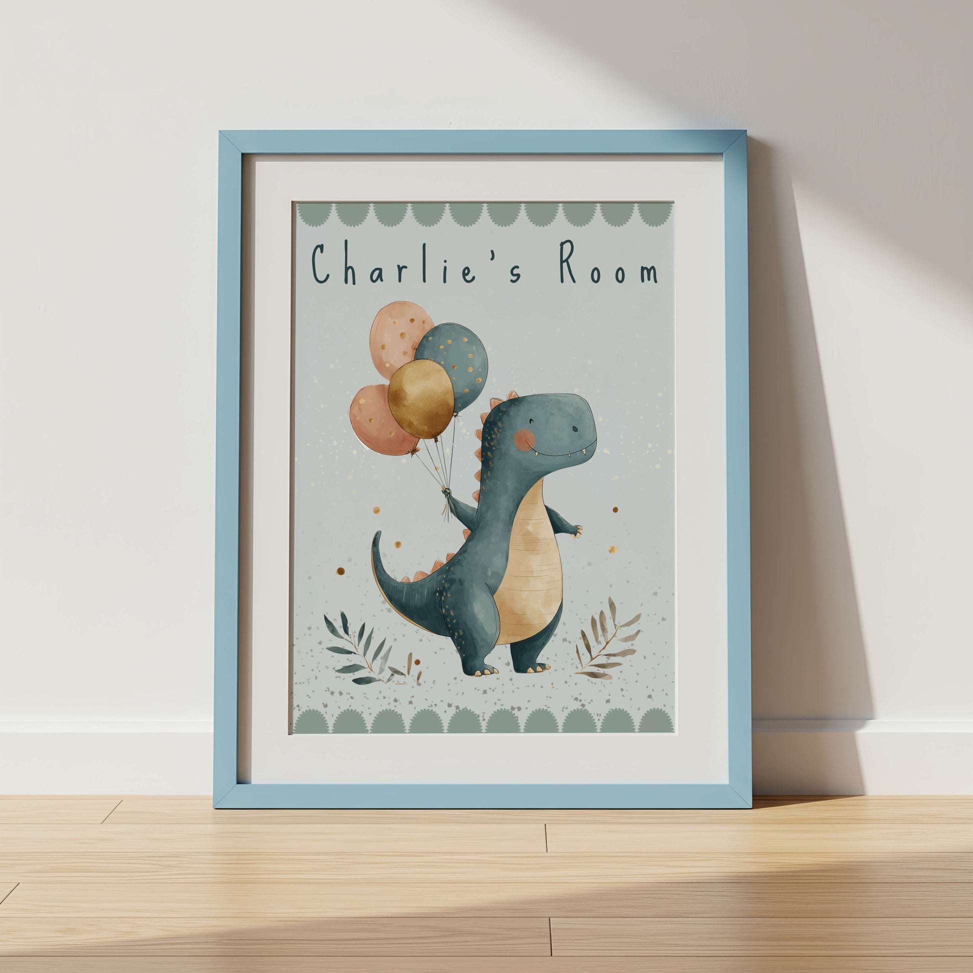 Framed children's poster with a dinosaur holding balloons on a wooden shelf.