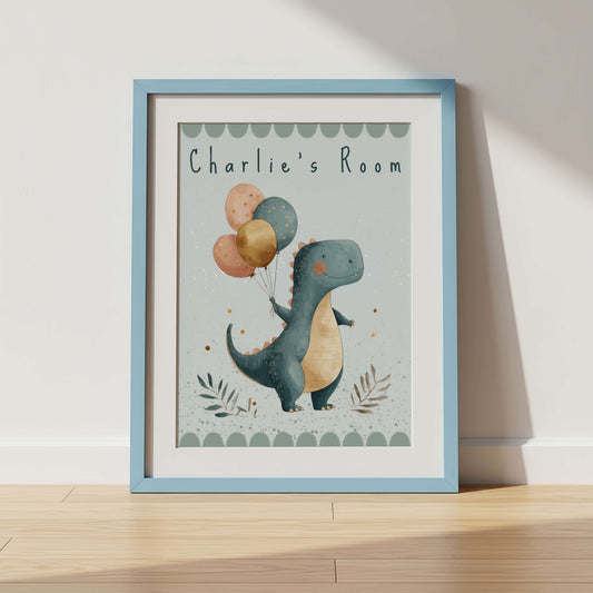 Framed children's poster with a dinosaur holding balloons on a wooden shelf.