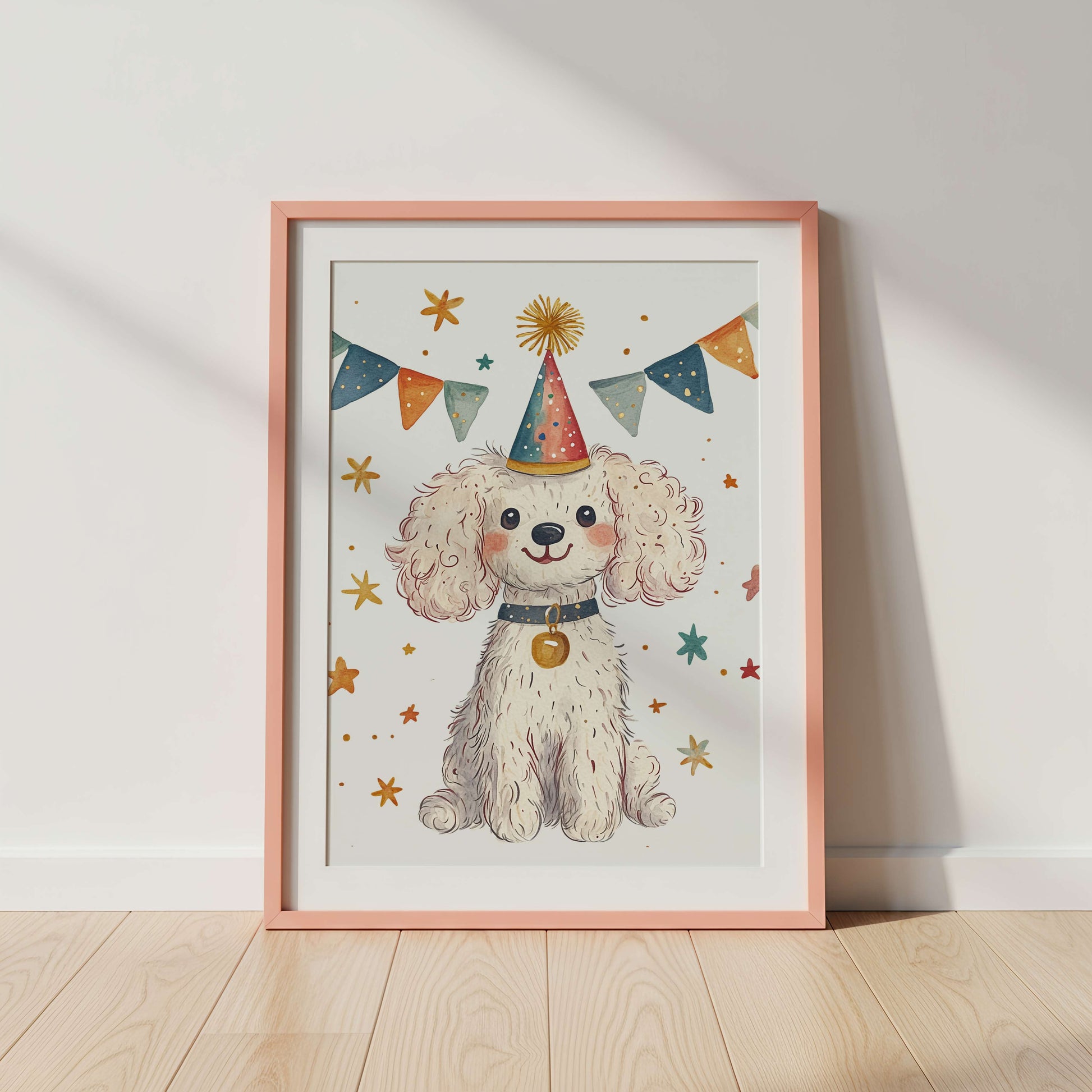 Framed artwork of a dog wearing a party hat with colorful decorations on a white wall.