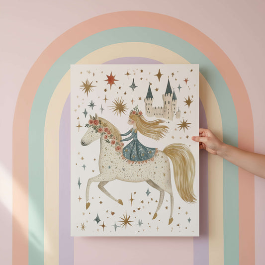 Illustration of a princess on a horse with stars and a castle, held by a hand against a pastel rainbow arch.