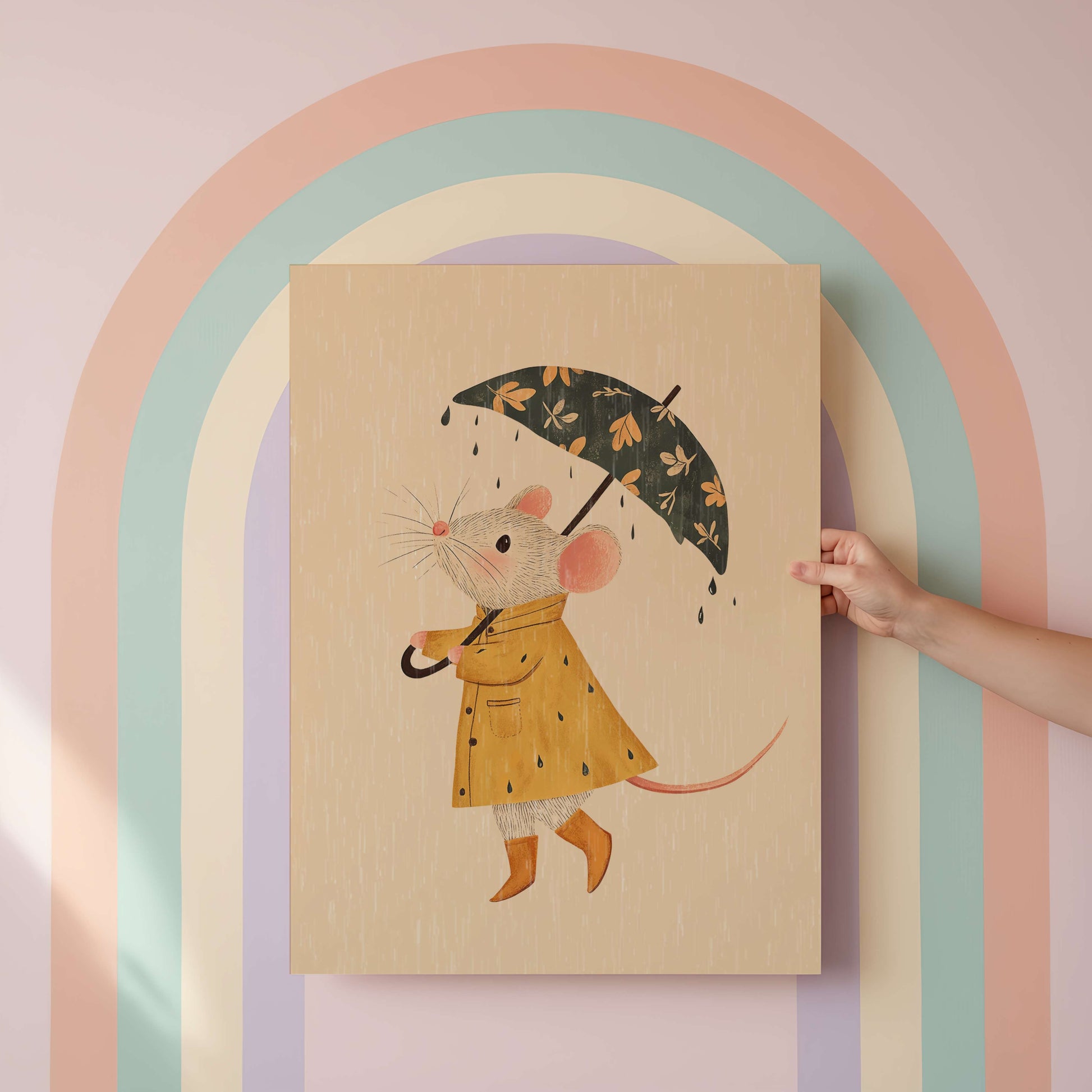 Illustration of a mouse in a raincoat holding an umbrella on a cardboard background with a rainbow arch.